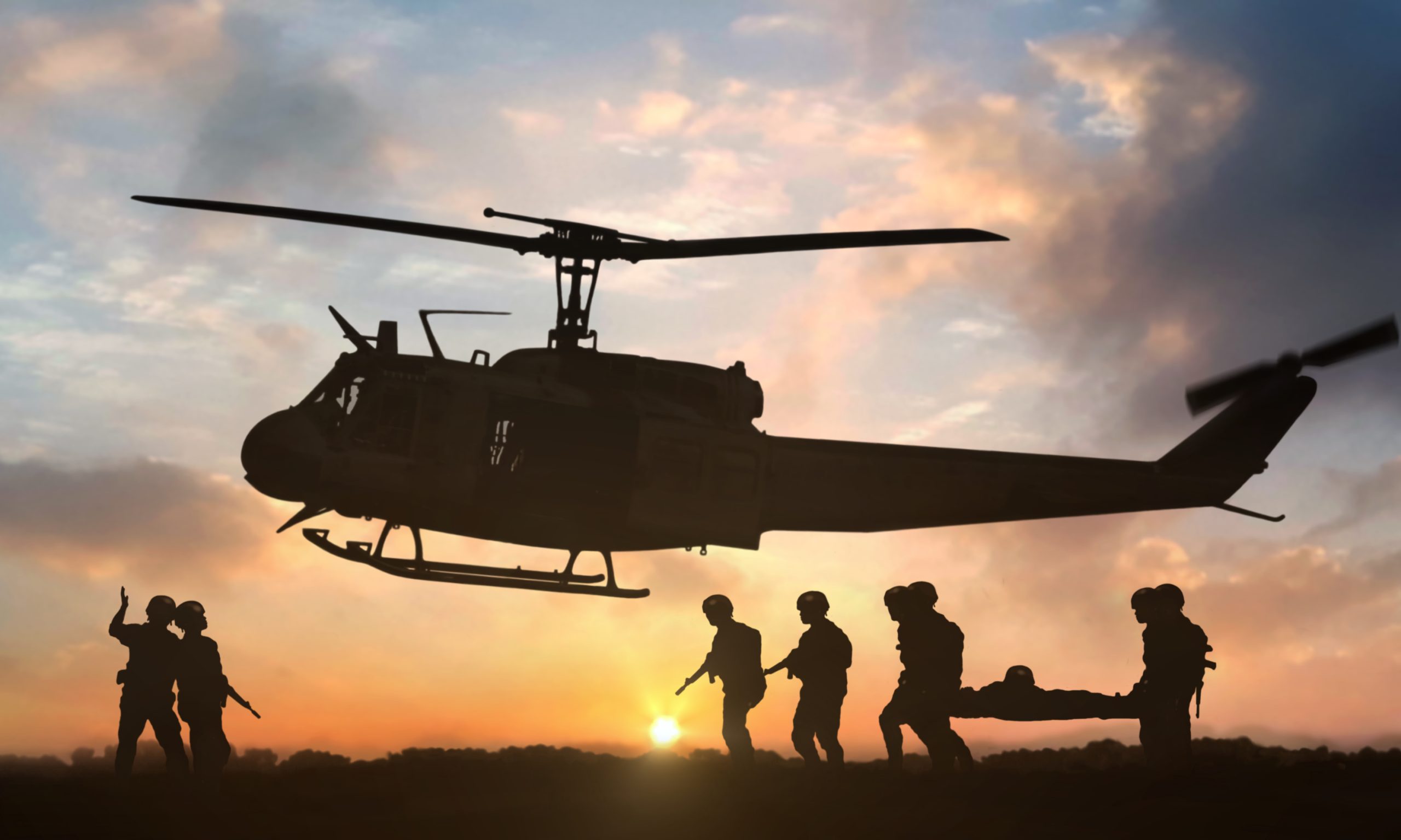 Military rescue helicopter during sunset